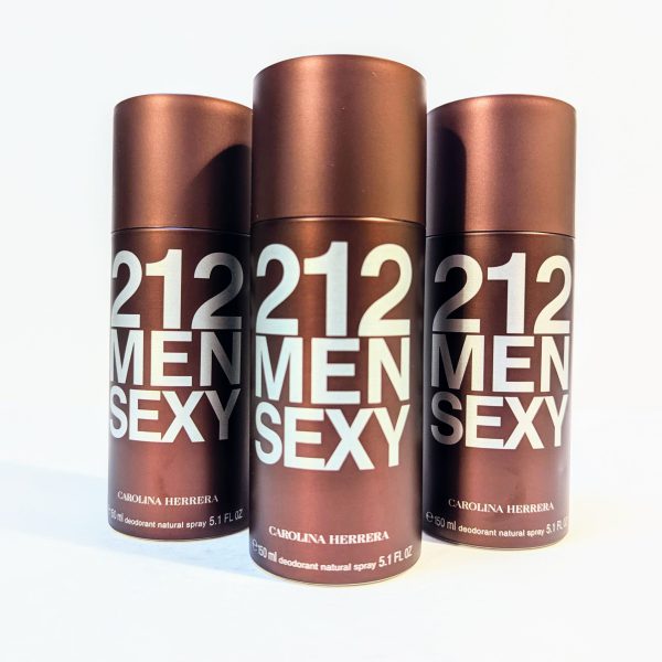 Three bottles of "212 Men Sexy" deodorant spray by Carolina Herrera are displayed side by side, with a brown and silver design. Three bottles of "212 Men Sexy" deodorant spray by Carolina Herrera are displayed side by side, with a brown and silver design.