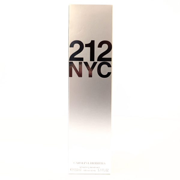 A rectangular silver box with "212 NYC" prominently displayed on the front. Below is text indicating it is a 150ml Carolina Herrera fragrance product.