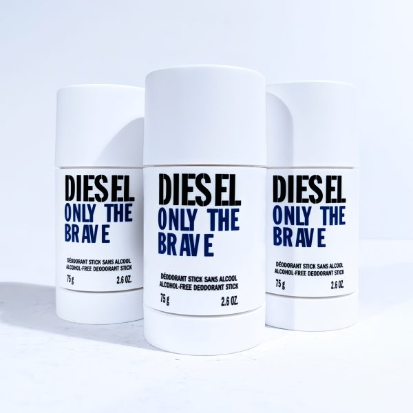 Three white deodorant sticks with the label "Diesel Only The Brave" displayed against a white background.