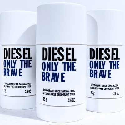 Three white deodorant sticks with the label "Diesel Only The Brave" displayed against a white background.