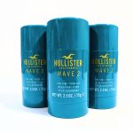 Three blue containers of Hollister California Wave 2 deodorant stick for men, 75g each, are standing side by side on a white background.