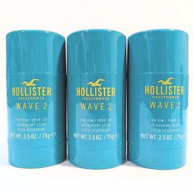 Three teal-colored deodorant sticks labeled "Hollister California Wave 2 For Him," each containing 2.5 oz (75 g) of product, are arranged side by side.