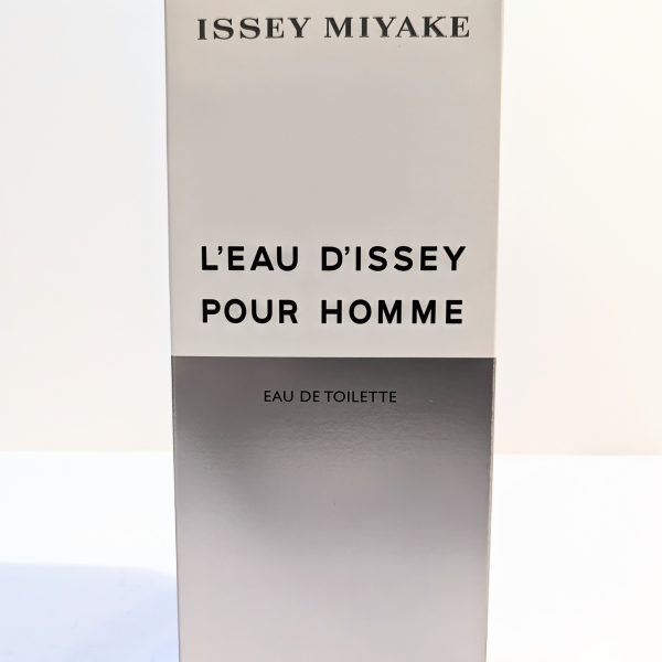 A photograph of a box for Issey Miyake L'eau D'Issey Pour Homme Eau de Toilette. The box is white and gray with black text.