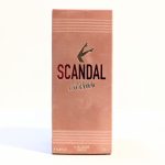 A pink rectangular box of Jean Paul Gaultier's "Scandal" fragrance against a white background.