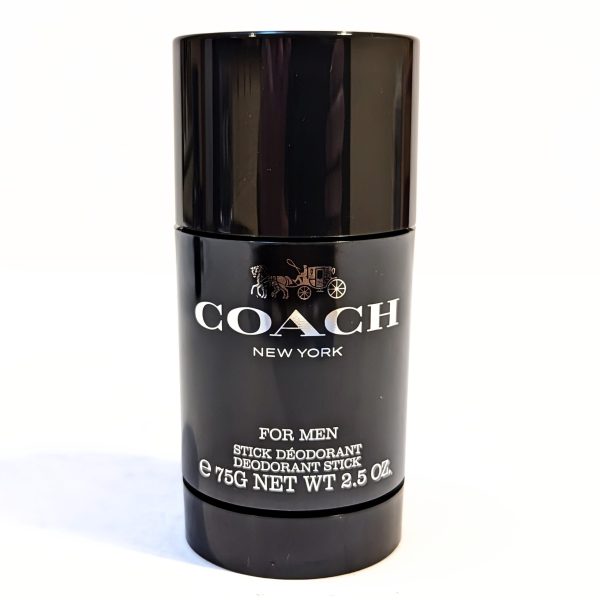 Black Coach New York deodorant stick, labeled "For Men," 75g, with a glossy finish and logo featuring a horse-drawn carriage.