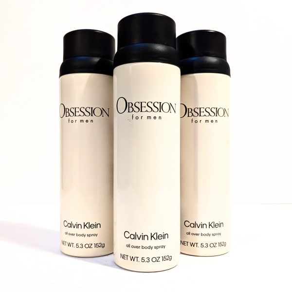 Three bottles of 3x Calvin Klein Obsession for Men Deodorant Spray 150ml each, arranged in a slightly staggered formation against a white background. Three bottles of 3x Calvin Klein Obsession for Men Deodorant Spray 150ml each, arranged in a slightly staggered formation against a white background.