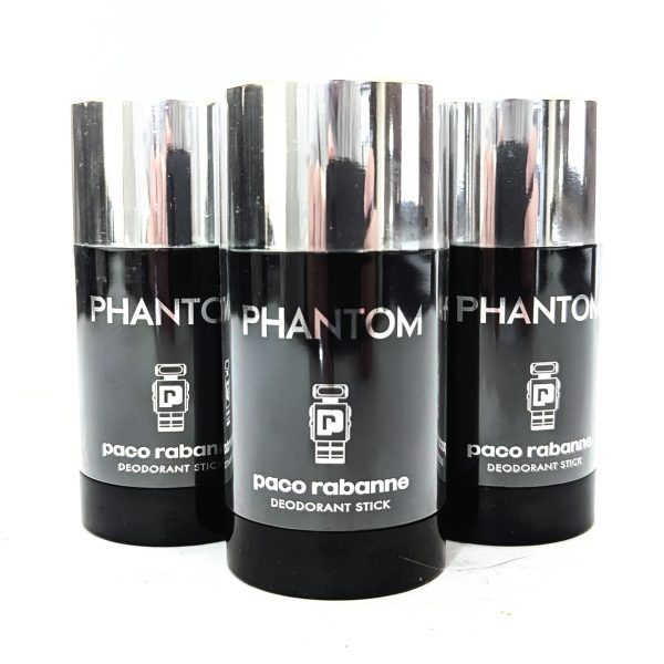 Three 75ml Paco Rabanne Phantom Deodorant Sticks are lined up side by side on a white background. Three 75ml Paco Rabanne Phantom Deodorant Sticks are lined up side by side on a white background.