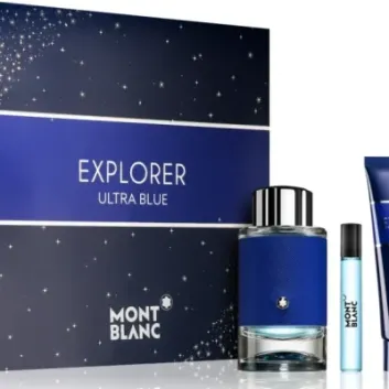 Mont Blanc Explorer Ultra Blue Gift Set for Men includes 100ml EDP, 7.5ml EDP travel spray, and 100ml shower gel, attractively displayed in front of a blue box decorated with stars and silver branding.