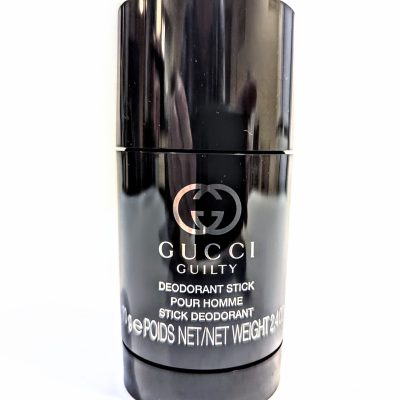 A black cylindrical deodorant stick labeled "2x Gucci Guilty Deodorant Stick for Men, 75ml" with silver text, stands upright on a white background.