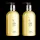 Two bottles of Molton Brown Orange & Bergamot Hand Wash 300ml with pump dispensers, each containing yellow liquid.