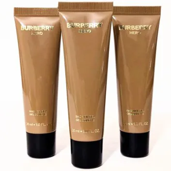 Three upright 30ml tubes of Burberry Hero Shower Gel Body Wash for Men, featuring gold text on brown packaging with black caps, are shown against a white background. Product: 3x Burberry Hero 30ml Shower Gel Body Wash for Men.