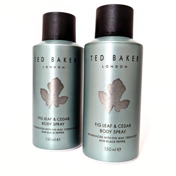 Two bottles of Ted Baker London Fig Leaf & Cedar Body Spray, 150 ml each, with a minimalist design featuring a silhouette of leaves on the label.