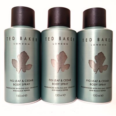 Three identical bottles of Ted Baker Fig Leaf & Cedar body spray with black caps, each 150 ml. Labels feature a leaf design and text describing fragrance notes and brand.