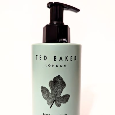 A Ted Baker London hydrating hand wash bottle with a black pump, featuring a leaf design on the label.