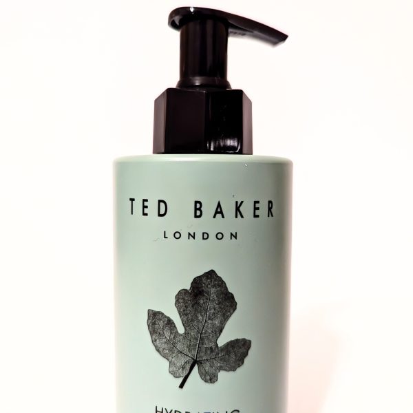 A Ted Baker London hydrating hand wash bottle with a black pump, featuring a leaf design on the label.