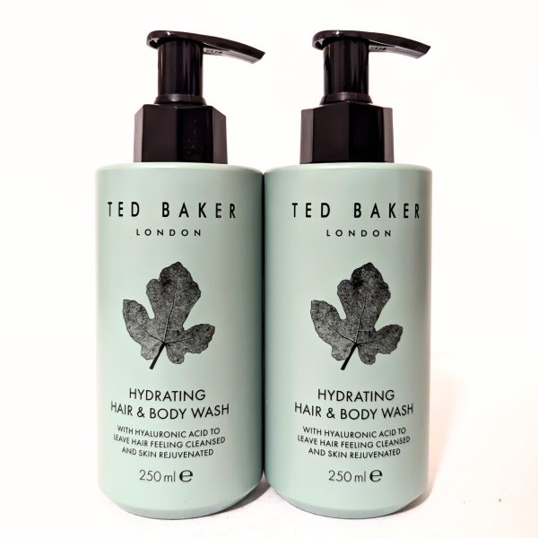 Two bottles of Ted Baker London Hydrating Hair & Body Wash, each 250 ml, with black pump tops and leaf design on light green labels.