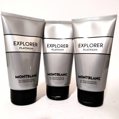 Three tubes of Montblanc Explorer Platinum all-over shower gel, each with a silver label and black cap, are arranged in a row against a plain white background.