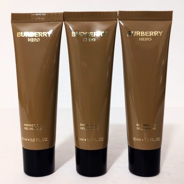 Three brown tubes of Burberry Hero shower gel, each containing 30 ml (1.0 FL OZ), arranged upright in a row against a plain background.