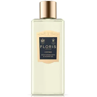 A clear bottle of Floris London Cefiro Moisturising Bath & Shower Gel 250ml, adorned with a gold cap and label featuring text and decorative elements.