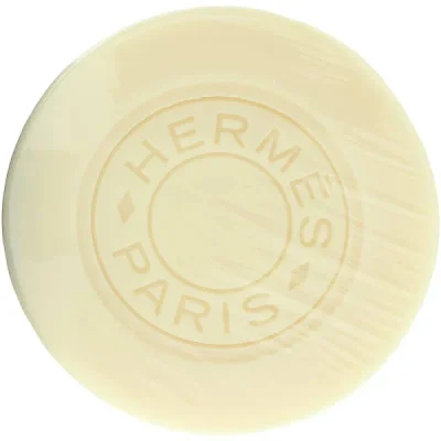 Beige Hermès Eau de Citron Noir 100g soap bar, embossed with "Hermès Paris.