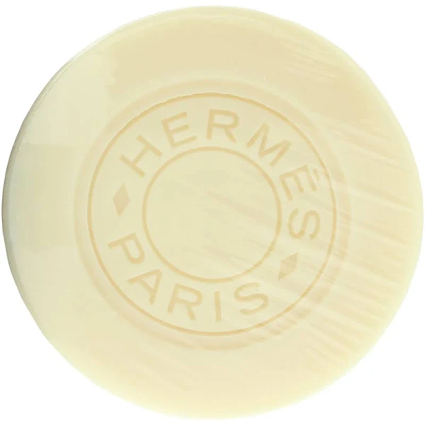 Beige Hermès Eau de Citron Noir 100g soap bar, embossed with "Hermès Paris.