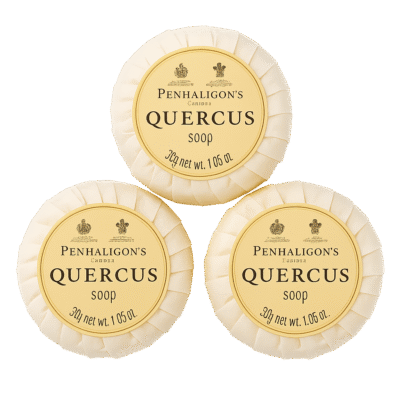 Three 30g bars of Penhaligon's Quercus Triple Milled Soap miniatures, each individually wrapped and labeled with the brand and product name.