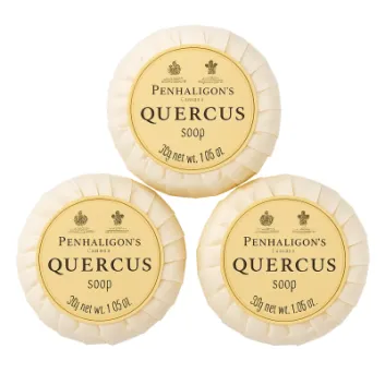 Three 30g bars of Penhaligon's Quercus Triple Milled Soap miniatures, each individually wrapped and labeled with the brand and product name.