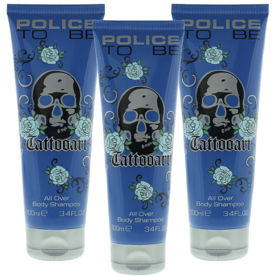 Three 100ml blue tubes of Police To Be Tattooart Shower Gel for Men, each featuring a skull and rose design on the front.