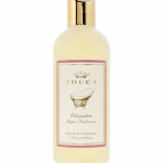 A 270 ml bottle of Tocca Cleopatra Body Wash Shower Gel for Women, featuring a gold cap and an illustrated vintage bathtub on the label.