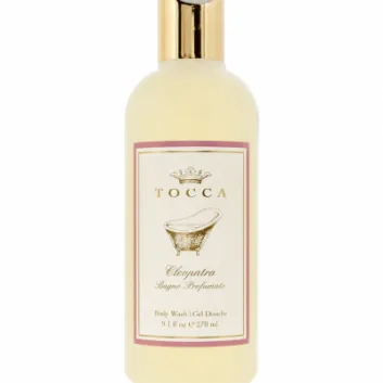 A 270 ml bottle of Tocca Cleopatra Body Wash Shower Gel for Women, featuring a gold cap and an illustrated vintage bathtub on the label.