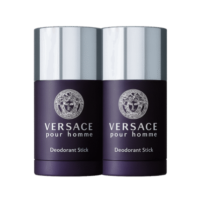 Two Versace New Homme Deodorant Sticks (75ml each) with dark purple bodies and silver caps are placed side by side against a plain white background.