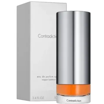 Calvin Klein Contradiction EDP Spray for Women, 100ml, is displayed beside its white box packaging, featuring orange liquid at the base of the bottle.