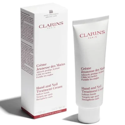 A tube and box of Clarins Skincare Hand & Nail Treatment Cream 100ml are shown standing upright on a white background.