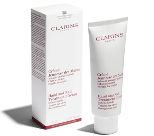 A tube and box of Clarins Skincare Hand & Nail Treatment Cream 100ml are shown standing upright on a white background.