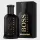 A black 100ml bottle of Hugo Boss Bottled Parfum for Men stands beside its matching black and gold box, both showing the brand name vertically.