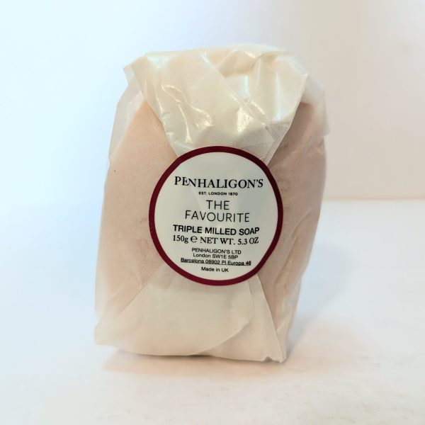 A wrapped bar of Penhaligon's The Favourite triple milled soap, 150g, with a round label displaying product details on the front.