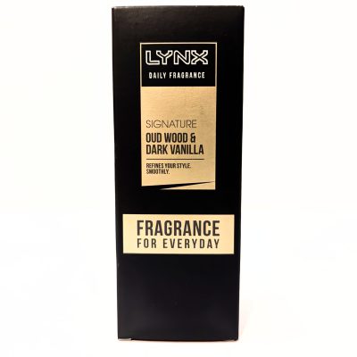 A black box labeled "Lynx Daily Fragrance," featuring the scent "Oud Wood & Dark Vanilla" and the text "Fragrance for Everyday" on the front.