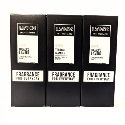 Three boxes of Lynx Daily Fragrance Urban Tobacco & Amber, labeled "Fragrance for Everyday," are displayed side by side against a white background.
