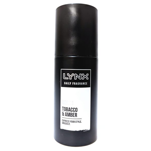 A black cylindrical Lynx daily fragrance spray can labeled "Tobacco & Amber" with white and black text on the front. A black cylindrical Lynx daily fragrance spray can labeled "Tobacco & Amber" with white and black text on the front.