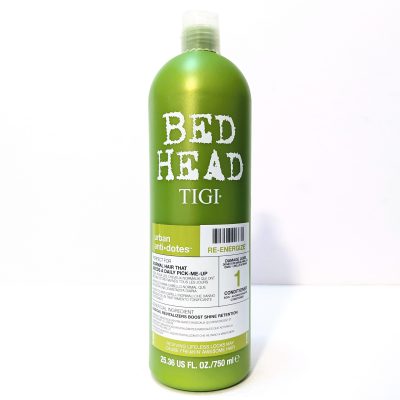 A green 25.36 fl. oz. bottle of Bed Head by TIGI Urban Antidotes Re-Energize shampoo is shown standing upright against a white background.