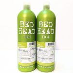 Two green bottles of Bed Head TIGI Urban Antidotes Re-Energize Level 1 Shampoo, each 25.36 fl oz (750 ml), standing side by side on a white background.