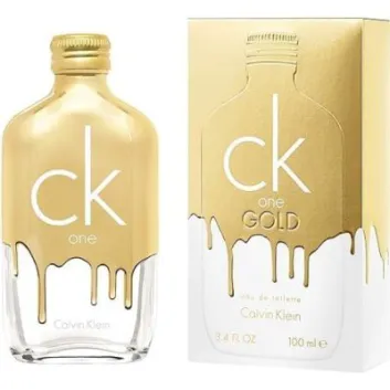 A 100ml bottle and box of Calvin Klein CK One Gold EDT for Men and Women, both with gold drip design and white branding.