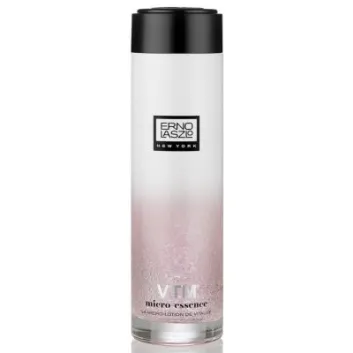 A tall, cylindrical bottle of Erno Laszlo VTM Micro Essence 150ml Facial Essence Lotion with a black cap and pink gradient design at the bottom.