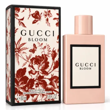 A 50ml bottle of Gucci Bloom Intense Eau de Parfum for Her stands beside its matching floral-patterned box, both labeled "Gucci Bloom" in black text on white backgrounds.