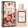 A 50ml bottle of Gucci Bloom Intense Eau de Parfum for Her stands beside its matching floral-patterned box, both labeled "Gucci Bloom" in black text on white backgrounds.