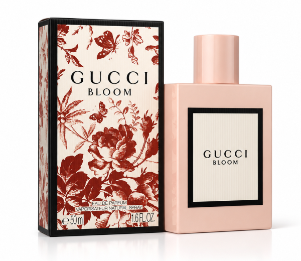 A Gucci Bloom Intense Eau de Parfum 50ml Spray for Her bottle stands next to its floral-patterned box, both featuring the brand logo and product name.