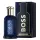 A dark blue bottle of Hugo Boss Bottled Triumph Elixir EDP Spray for Men, 50ml, stands beside its matching box, both adorned with bold gold lettering.