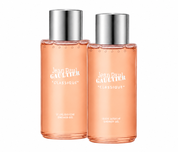 Two identical bottles of Jean Paul Gaultier Classique Bath & Shower Gel, 200ml, with silver caps and peach-colored liquid, are standing side by side against a white background.