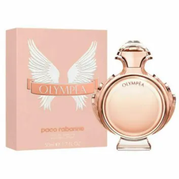 A bottle of Paco Rabanne Olympea 50ml EDP for Women is displayed beside its pink box with white wings and gold text. The perfume bottle is round and features a rose gold finish.