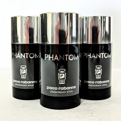 Three Paco Rabanne Phantom deodorant sticks with black and silver packaging are displayed side by side on a white surface.